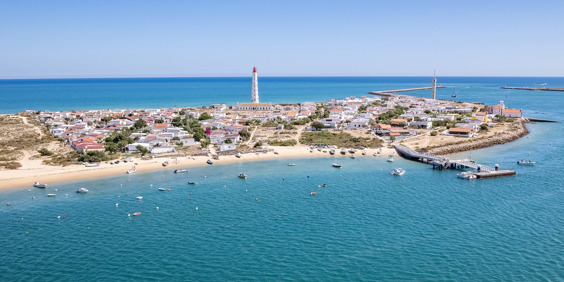 Algarve Culatra Island Farol 02 Shutterstock 2323023513